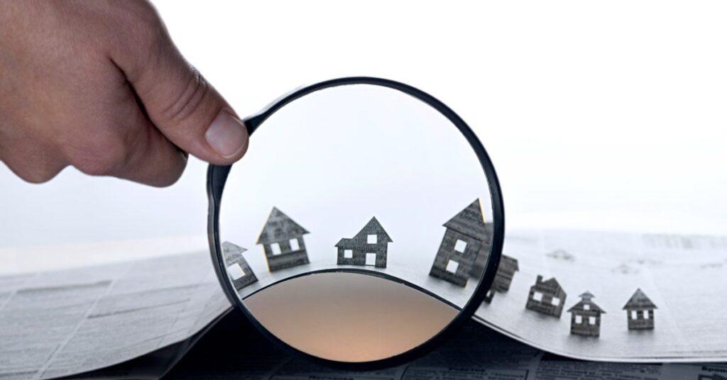 Magnifying glass on property to bag a bargain